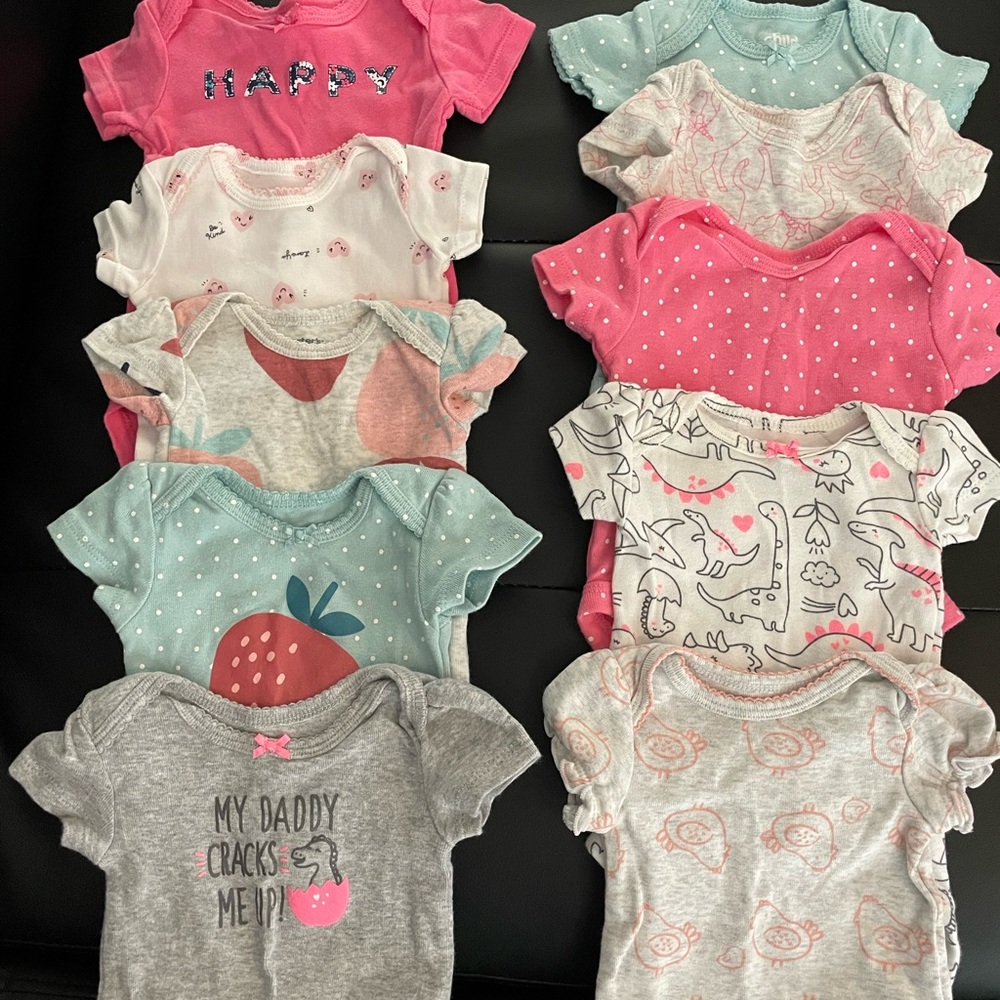 Newborn Carters bodysuits/ 23 short sleeved onesies.